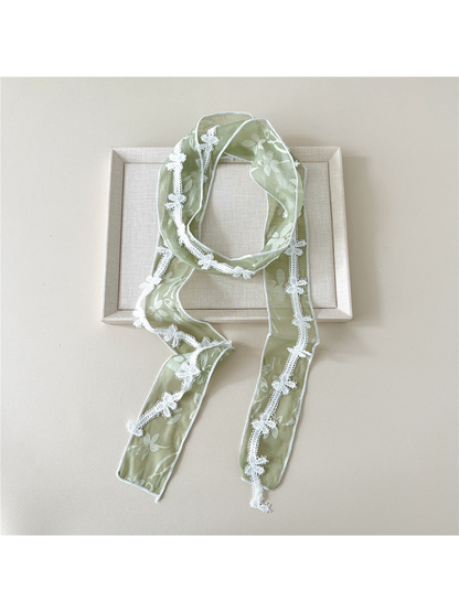 Green sheer narrow scarf with floral motifs and butterfly lace trim