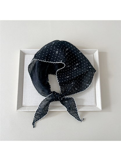 Black triangle scarf with polka dots, bow motifs and scalloped edging