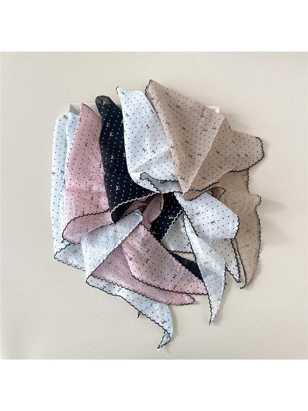 Multiple patterned triangle scarf colors arranged together