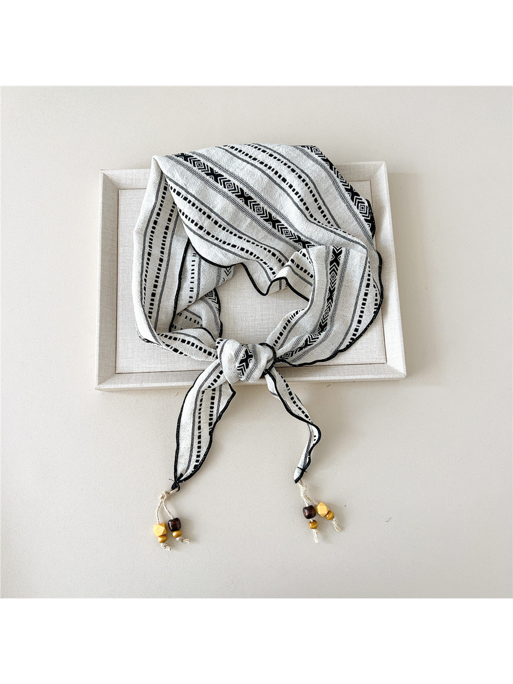 Off White geometric triangle scarf with bead-tipped ends