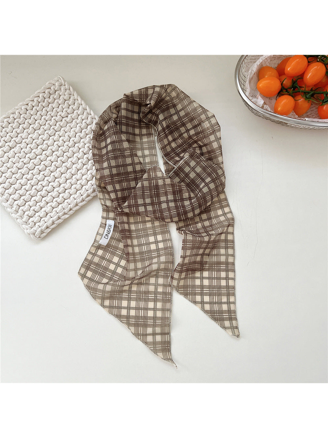 Beige Plaid long narrow scarf draped with pointed ends