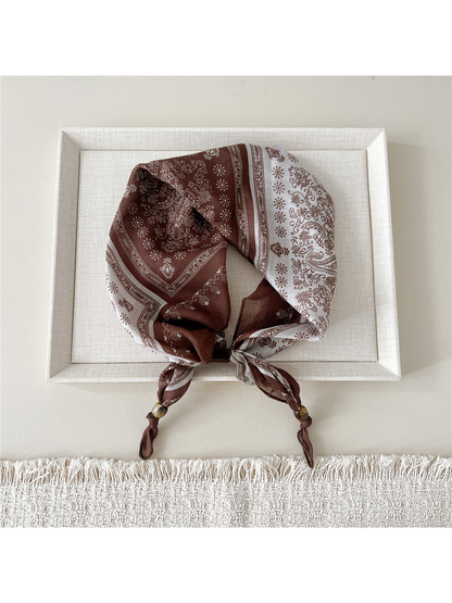 Bandana Paisley scarf-style headband in brown and cream with beaded tie ends