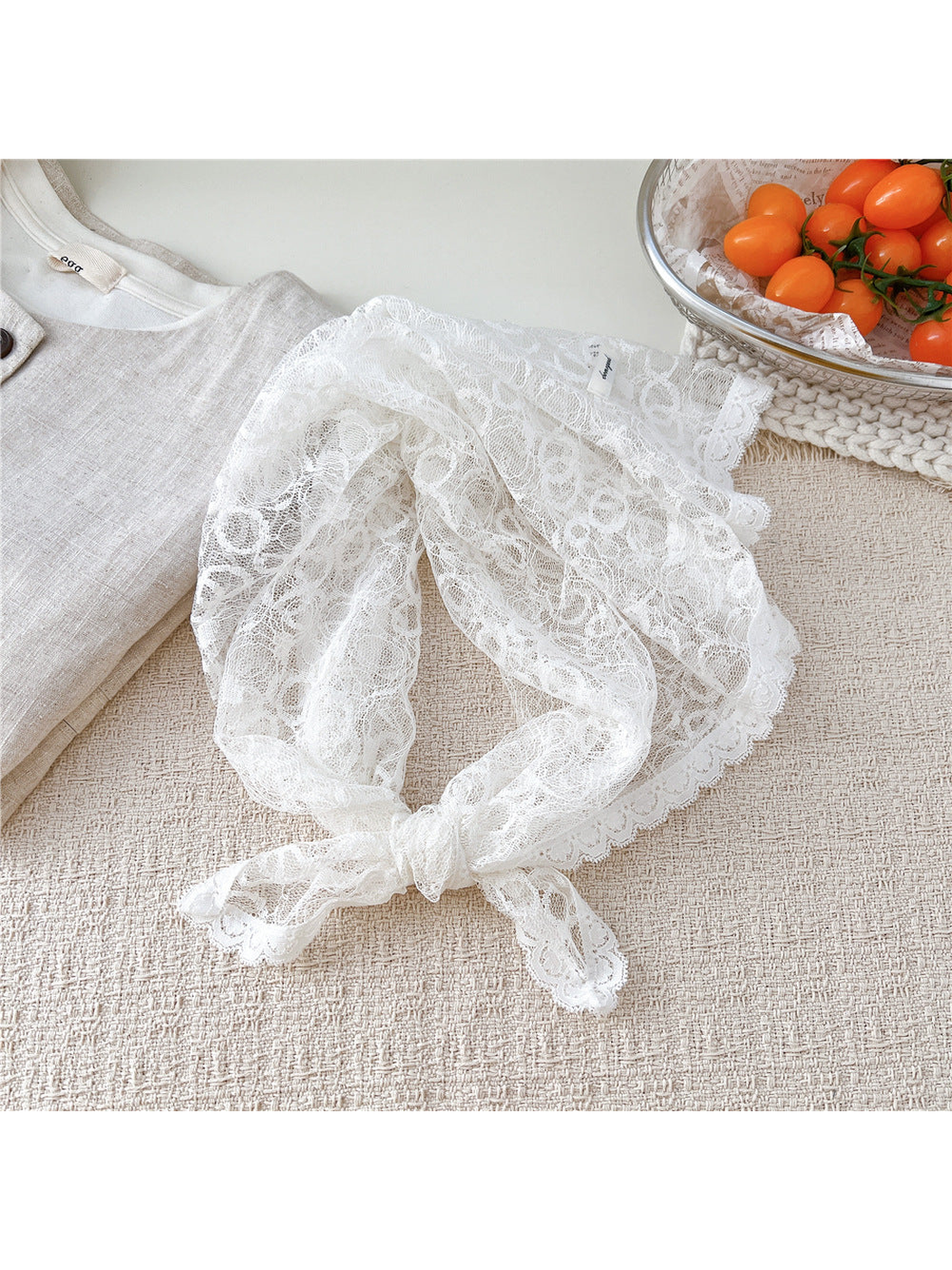 White Bubbles lace square scarf tied in a loop