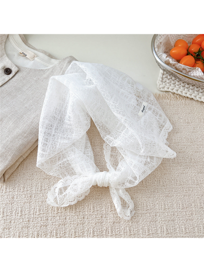 White Floral Grid lace square scarf tied in a loop
