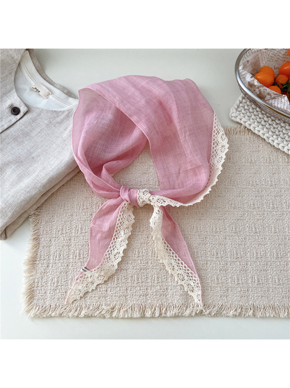 Light Pink triangle scarf tied with cream openwork lace trim