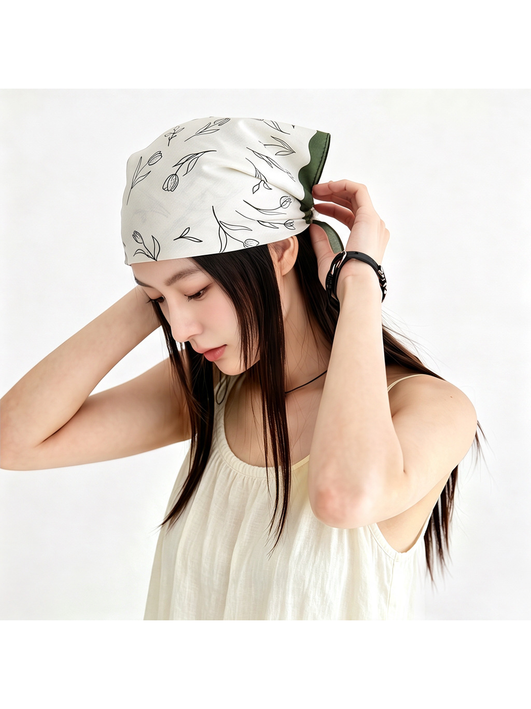 Green floral square scarf styled over the hair
