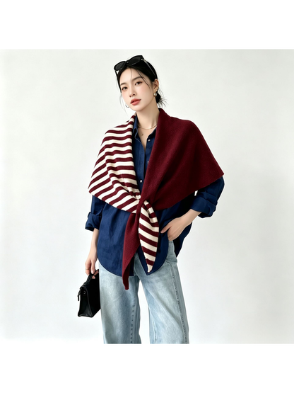 Burgundy and cream striped color-block scarf worn over a blue shirt