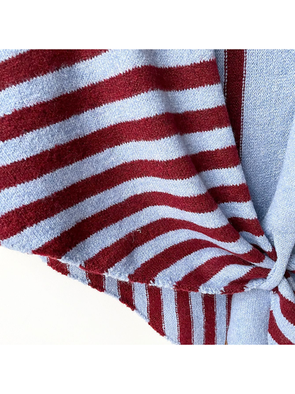 Close-up of the Blue Burgundy scarf's striped knit and stitched edge