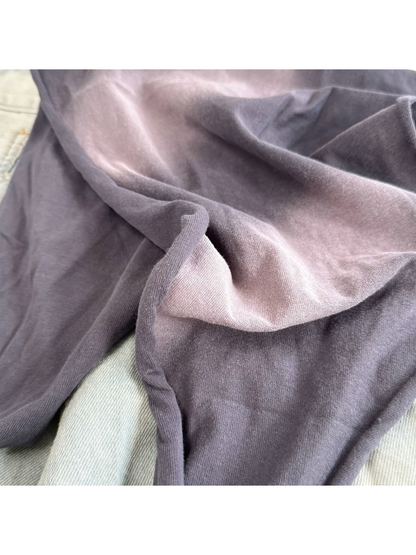 Close-up of the Dark Gray scarf's tonal surface and finished edge