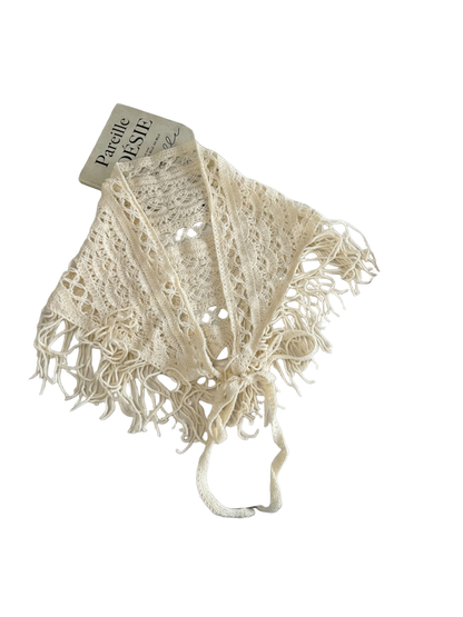 Ivory openwork triangle scarf with fringe and tie cords