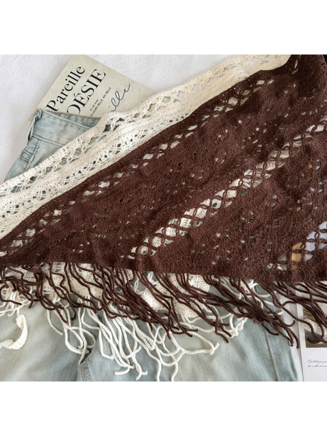 Close-up of Dark Brown and Ivory openwork patterns and fringe