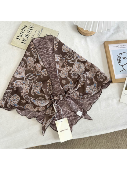Brown Paisley scarf with floral motifs and leafy reverse, tied display