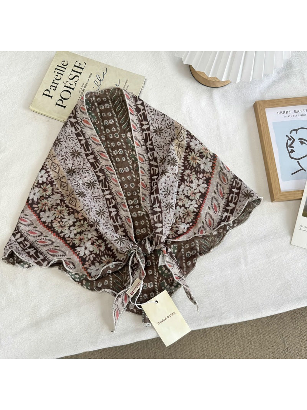 Coffee Patchwork scarf with floral and geometric striped pattern, tied display