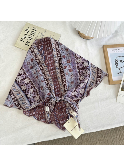 Burgundy Patchwork scarf with floral and geometric striped pattern, tied display