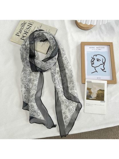 Black Floral scarf with outlined flower print, full view