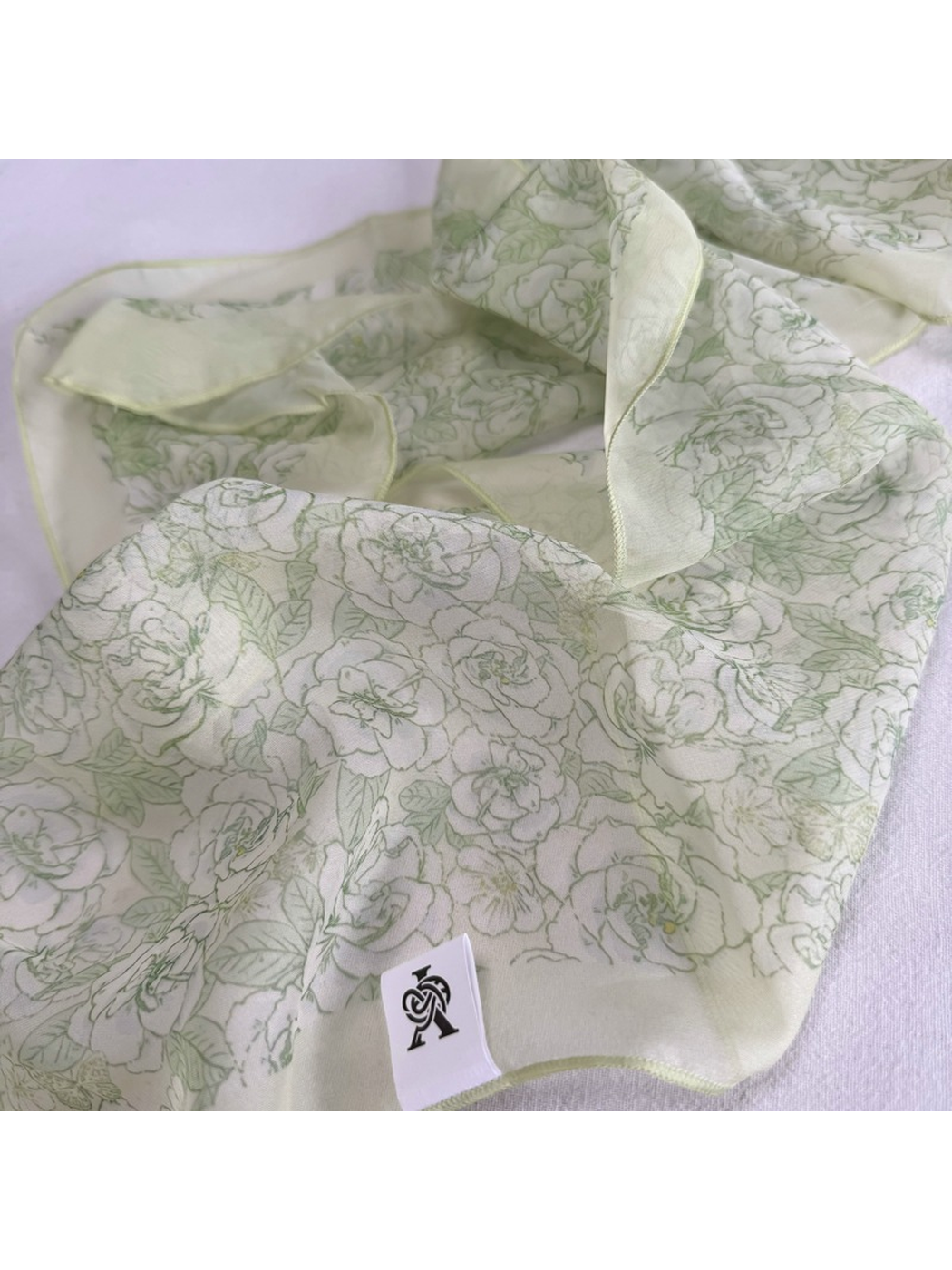 Close-up of the Green Rose line-art print and waved edge