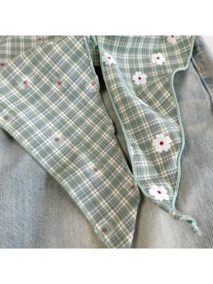Close-up of the Green scarf tie ends, reverse side and stitched edges