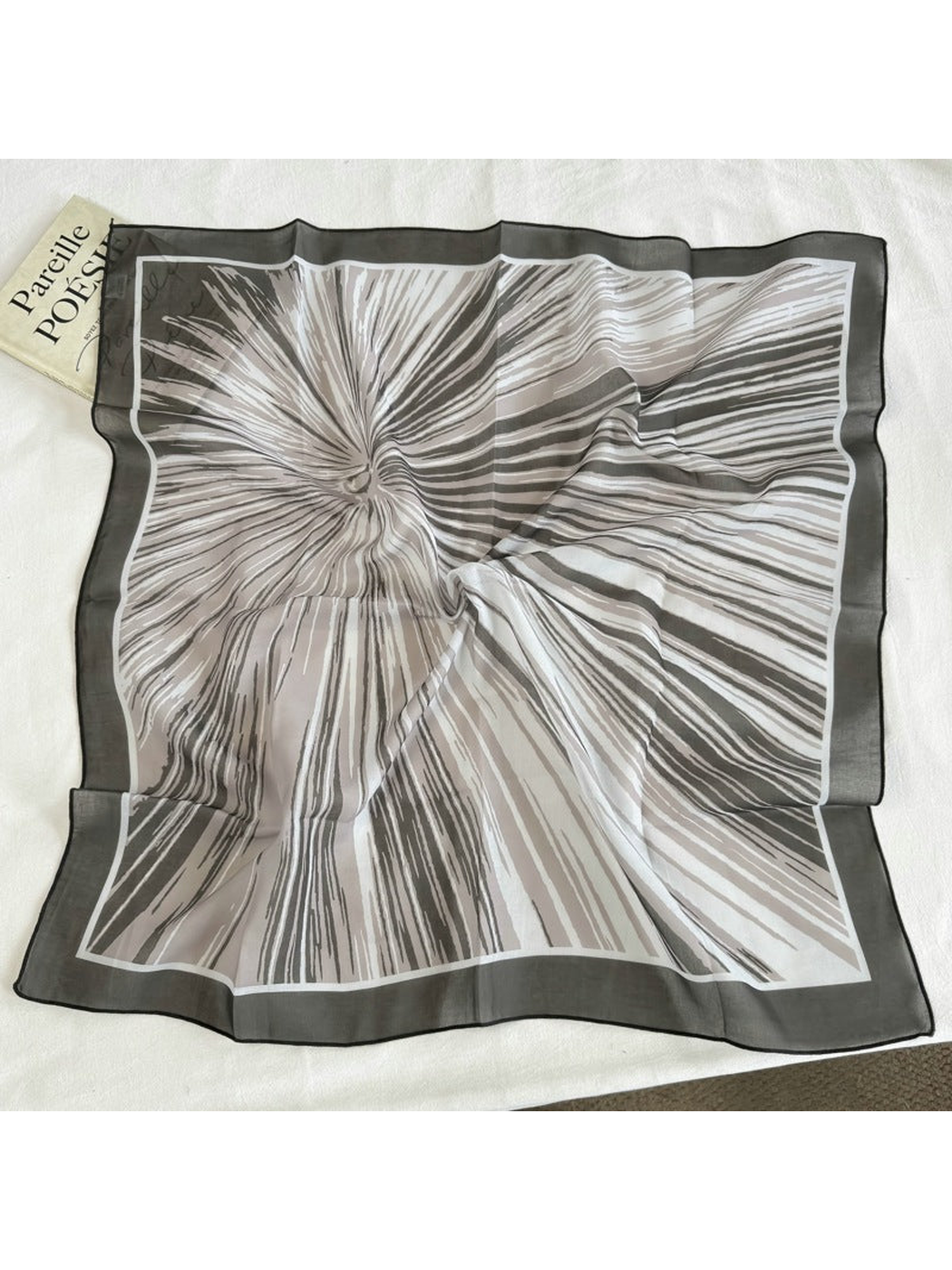 Black Stripes square scarf with radiating brushstroke pattern