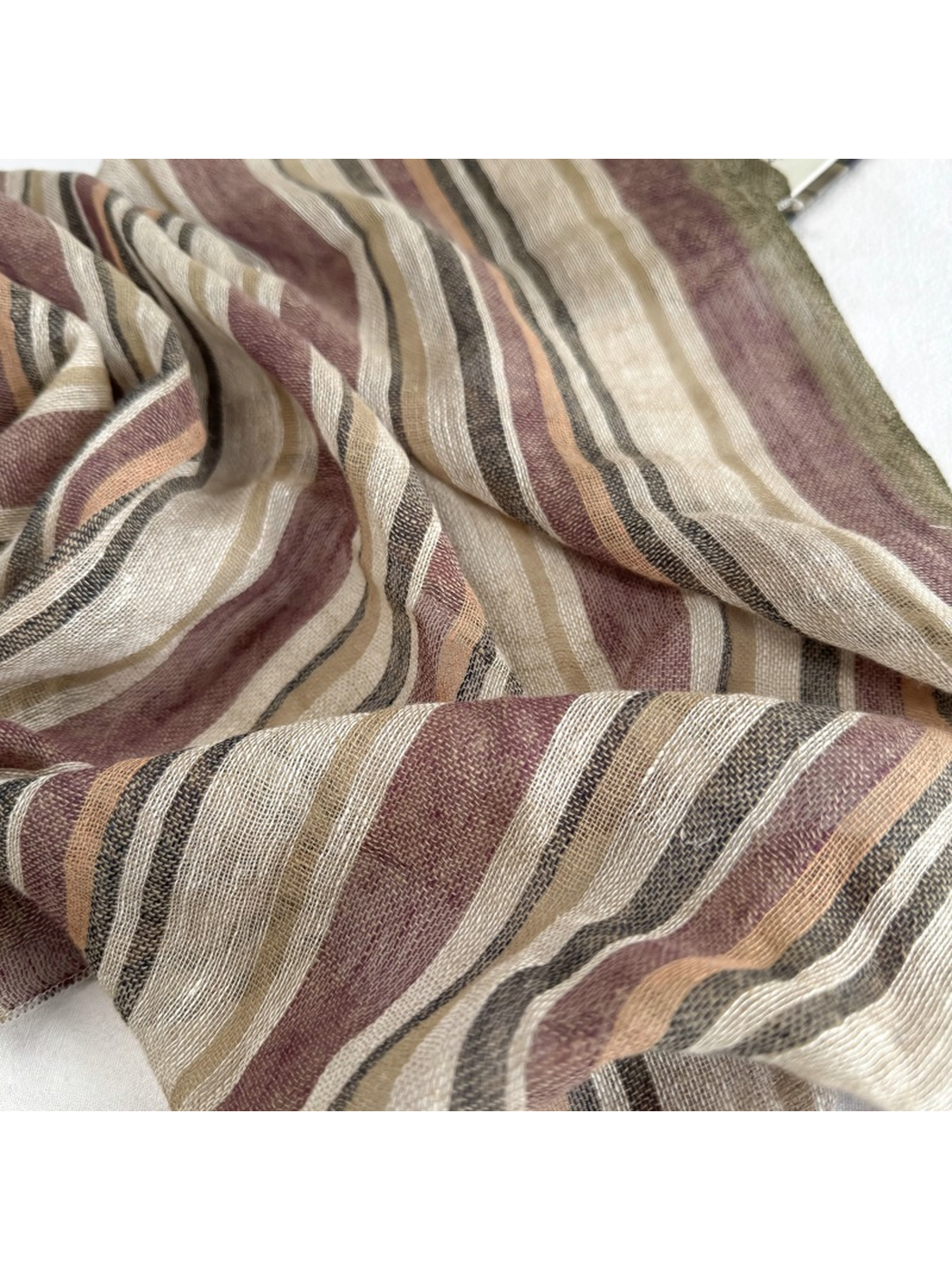 Close-up of the Multicolor Stripe scarf with narrow stripes and visible open weave
