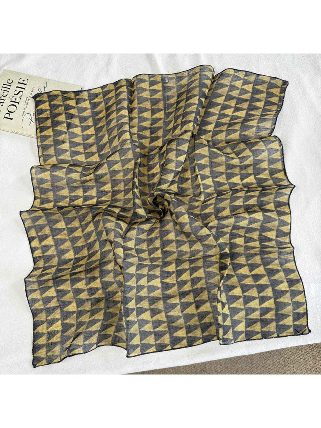 Geometric square scarf displayed open