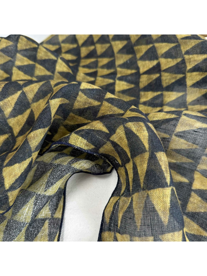 Close-up of the Geometric scarf pattern and woven texture