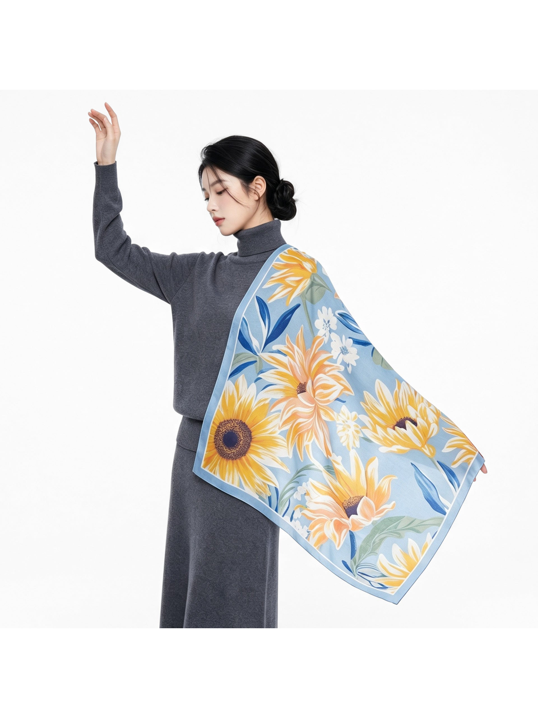 Light blue floral square scarf draped over the shoulder with the full pattern visible
