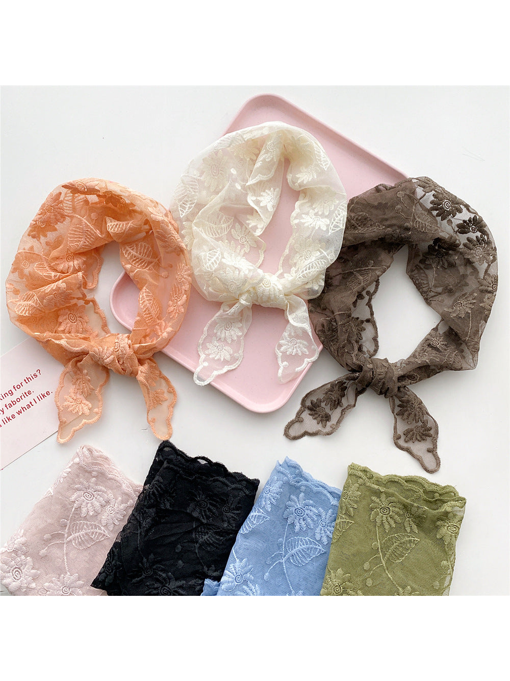 Orange, ivory and brown floral triangle scarves with folded color options