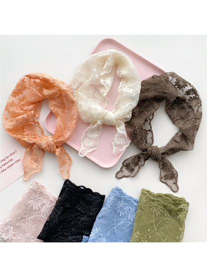 Orange, ivory and brown floral triangle scarves with folded color options