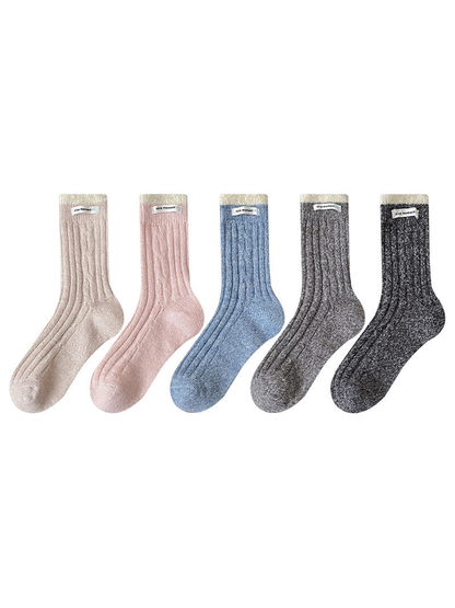 Beige, Light Pink, Light Blue, Heather Gray and Black Gray crew socks displayed together