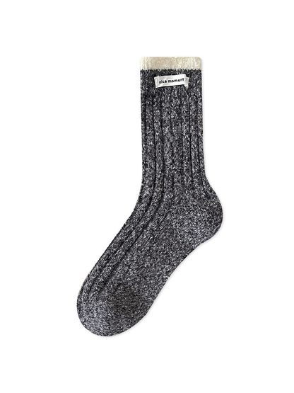 Black Gray ribbed crew sock with an ivory textured cuff, full view