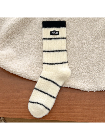 Black striped fuzzy crew sock, full product view