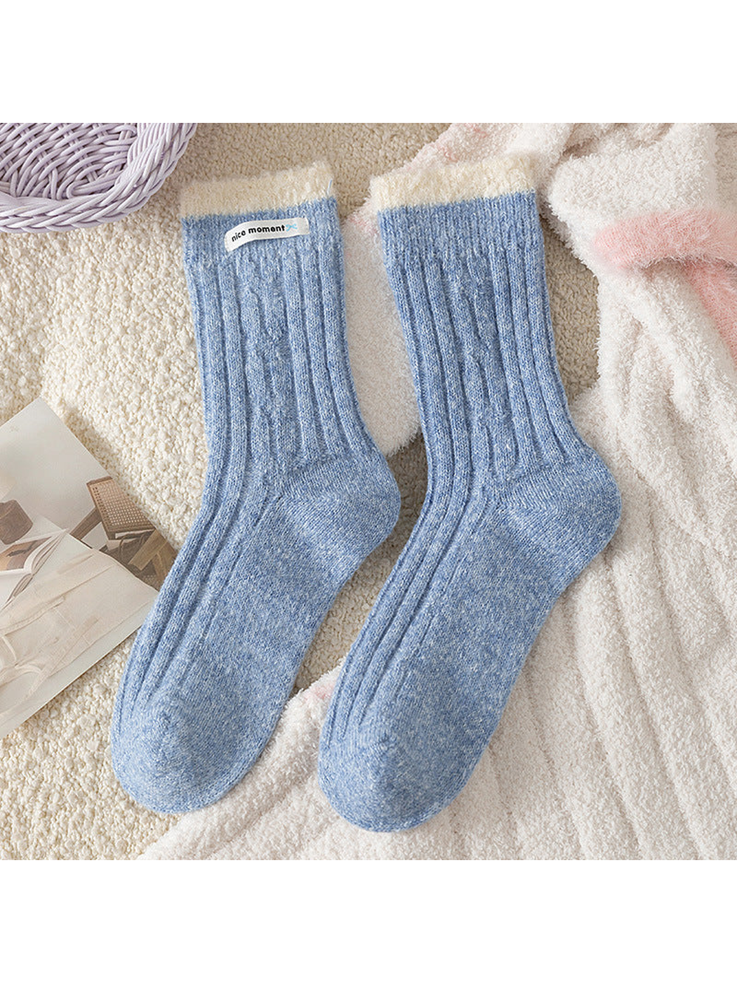 Light Blue ribbed crew socks with contrasting fuzzy cuffs, flat lay
