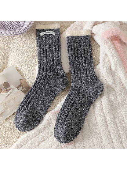 Dark Gray ribbed crew socks with contrasting fuzzy cuffs, flat lay