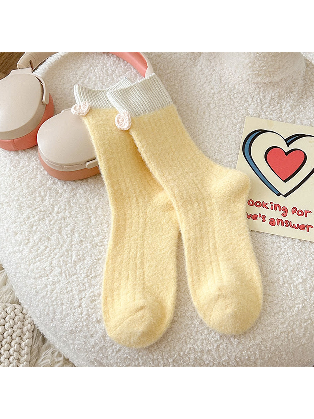 Yellow crew socks with ivory ribbed cuffs and heart accents