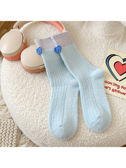 Light Blue crew socks with light purple ribbed cuffs and blue heart accents