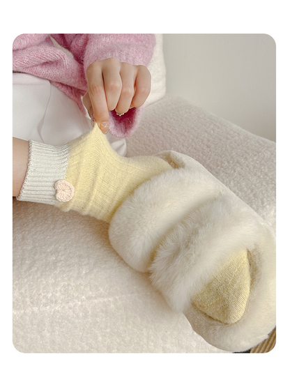 Close-up of a Yellow crew sock being gently stretched above the ankle