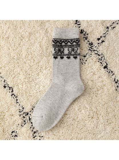 Light Gray crew sock with a black geometric cuff motif, flat view