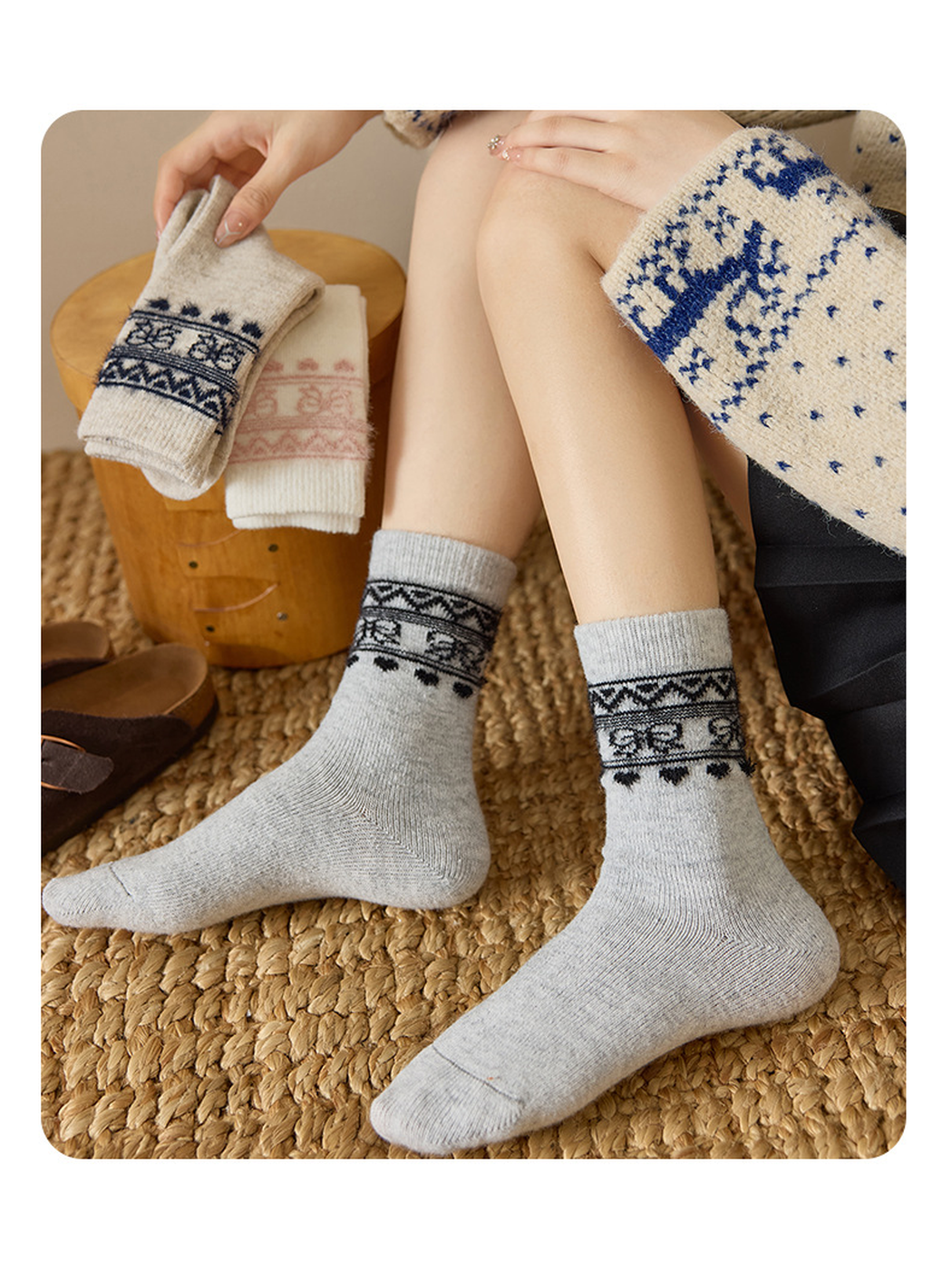 Light Gray geometric-border socks worn in a seated view