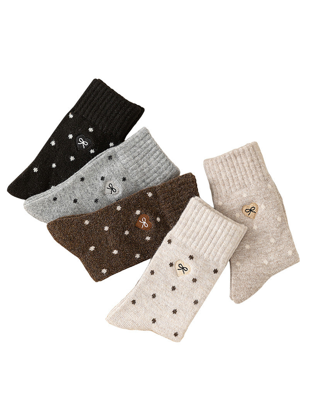 Five colors of dot-pattern crew socks with ribbed cuffs and bow patches