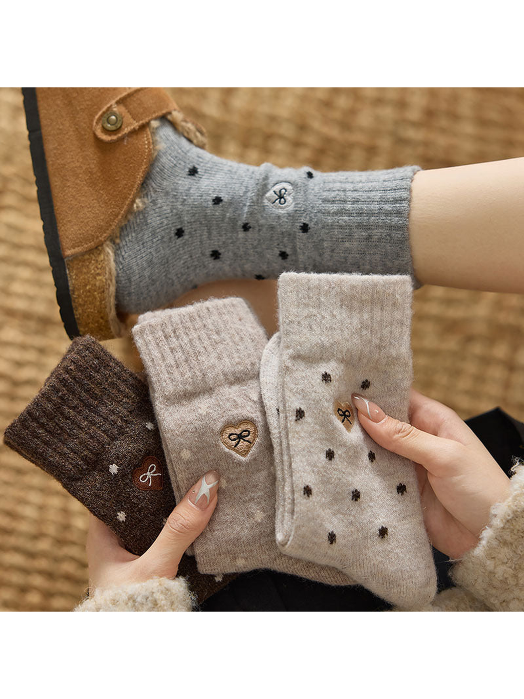 Heather Gray dot-pattern crew socks worn with coordinating colors held in hand