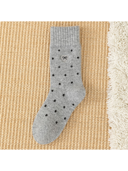 Heather Gray dot-pattern crew sock with ribbed cuff and bow patch
