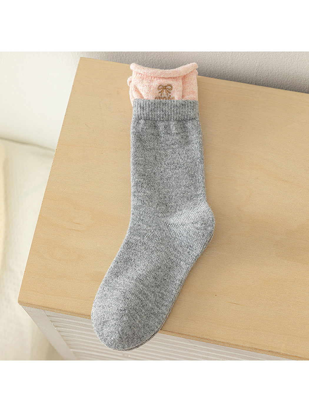 Light Gray crew sock with pink contrast cuff and embroidered bow
