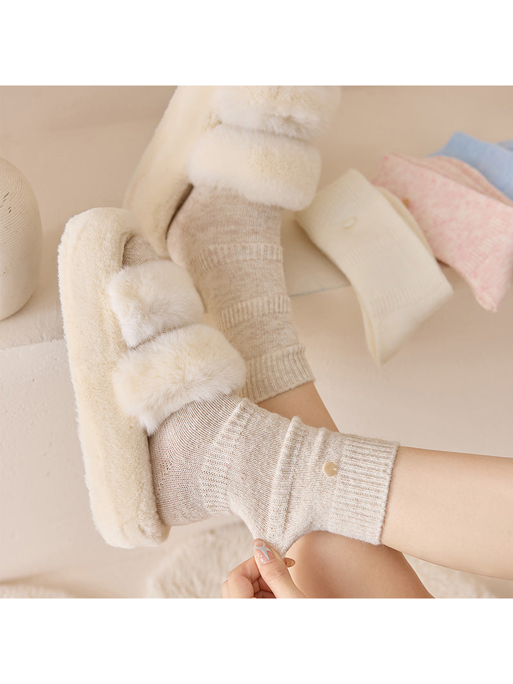 Close-up of Beige crew socks with ribbed cuffs and fine knit texture
