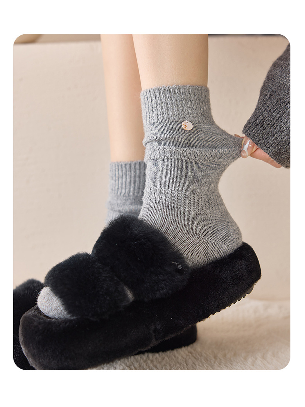Close-up of Heather Gray crew sock showing ribbed bands and round cuff accent