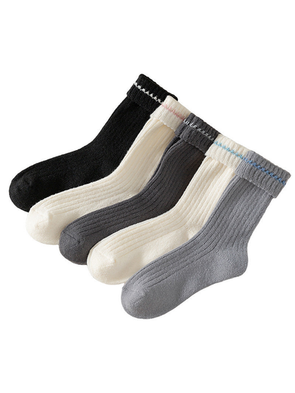 Black, ivory and gray ribbed crew socks with folded contrast-trim cuffs