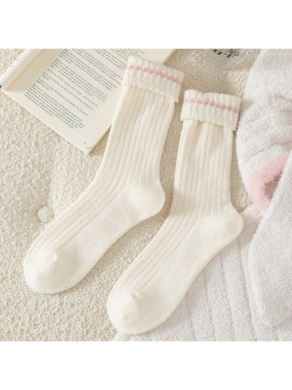 Ivory Pink ribbed crew socks with folded cuffs