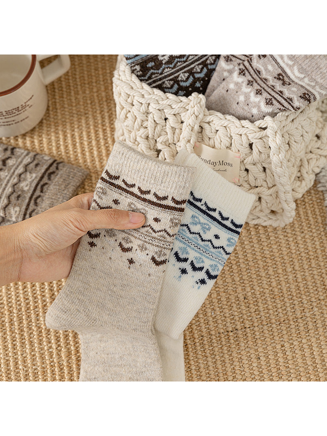Two neutral patterned crew sock styles held together
