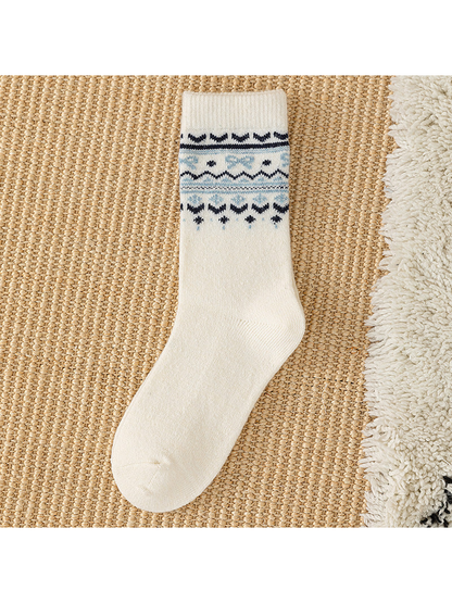 Ivory crew sock with navy and light blue geometric cuff bands