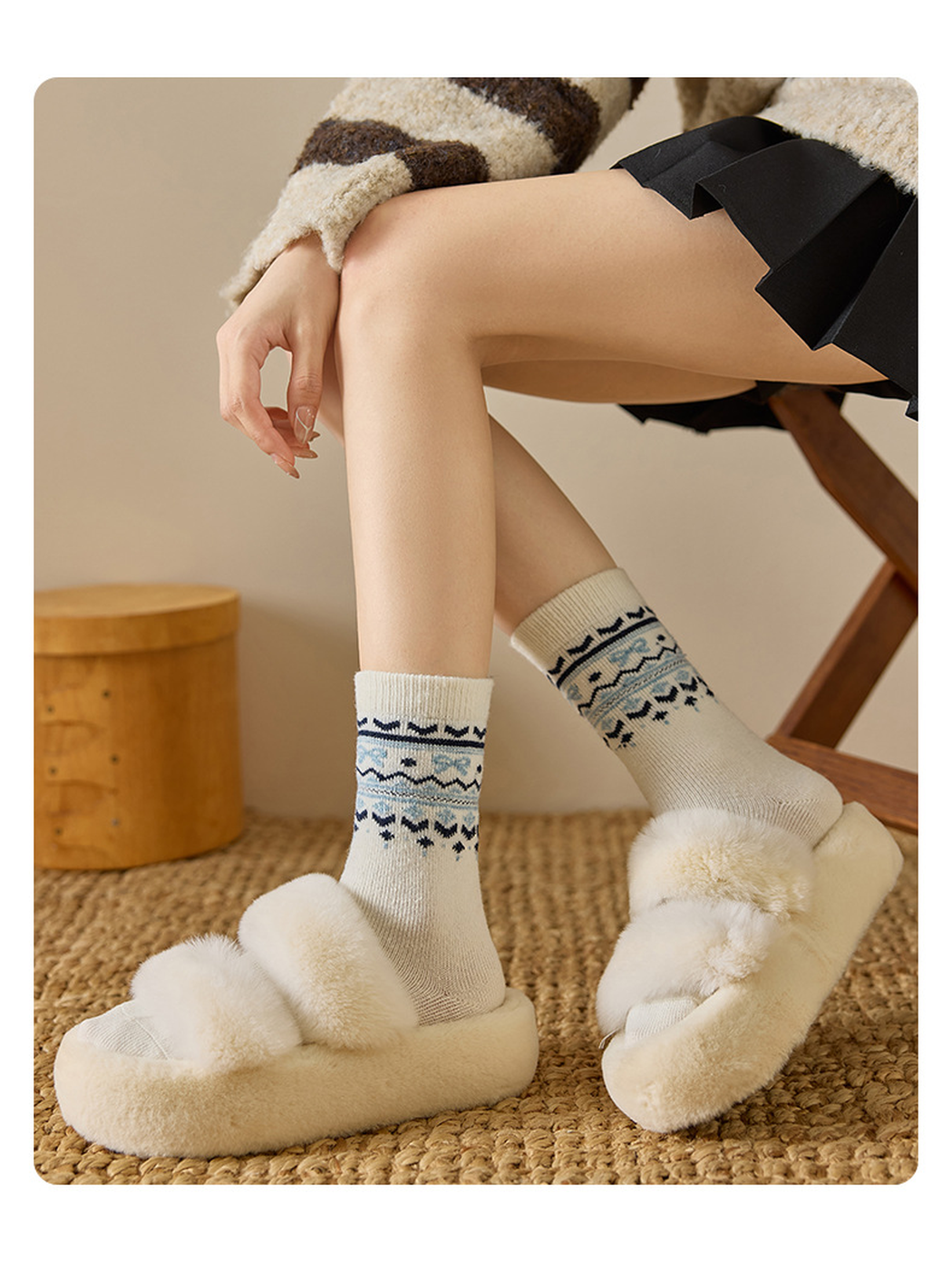 Ivory patterned crew socks styled with plush slippers