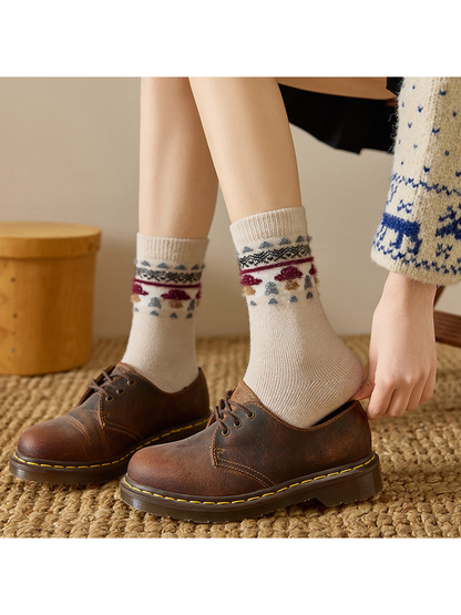 Beige mushroom motif crew socks worn with brown lace-up shoes